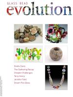 Product Description: Volume 7, Issue 2</br></br>GlassBeadEvolutionis a magazine created by beadmakers for beadmakers and is inclusive of other mediums. Every issue features a complementary medium while maintaining an emphasis onglass.</br></br>GlassBeadEvolutionprovides its readership robust content that includes insight into artists' private worlds, tours of fascinating venues, tips and techniques for bothglassand complementary mediums, a showcase of exquisite work, and reviews of tools, materials, tutorials, and books.</br></br>Contents:</br></br>Artist SpotLightSheila Davis</br></br>Gathering XXVII-The Flame Within</br></br>Gathering VI-Echos of AncientGlass</br></br>Tutorial-Murrine Embellished DiskBeads</br></br>Advanced Tutorial-Copper Alchemy/Electroforming</br></br>Business Tips-Ask the Experts: How Do You TransportBeads</br></br>GlassChallenge- Colored Pencil onGlass</br></br>60 pages</br> Glass Bead Evolution Volume 7 Issue 2
